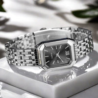 The Lady Is Just Wearing A Square Quartz Watch
