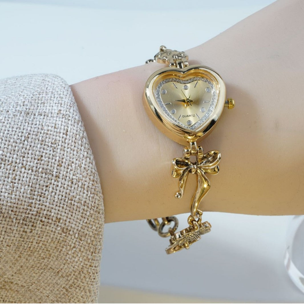 Retro Heart-shaped Bracelet Watch With A Golden Bow And Flower Design