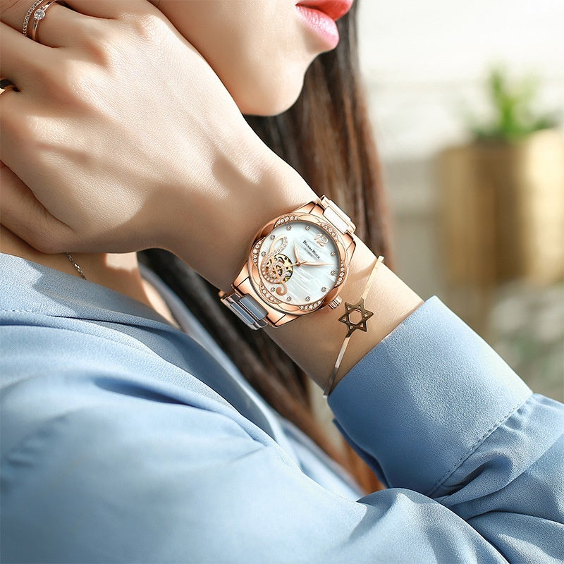 Deyi Bird Wine-Red Note Hollowed-Out Women's Watch